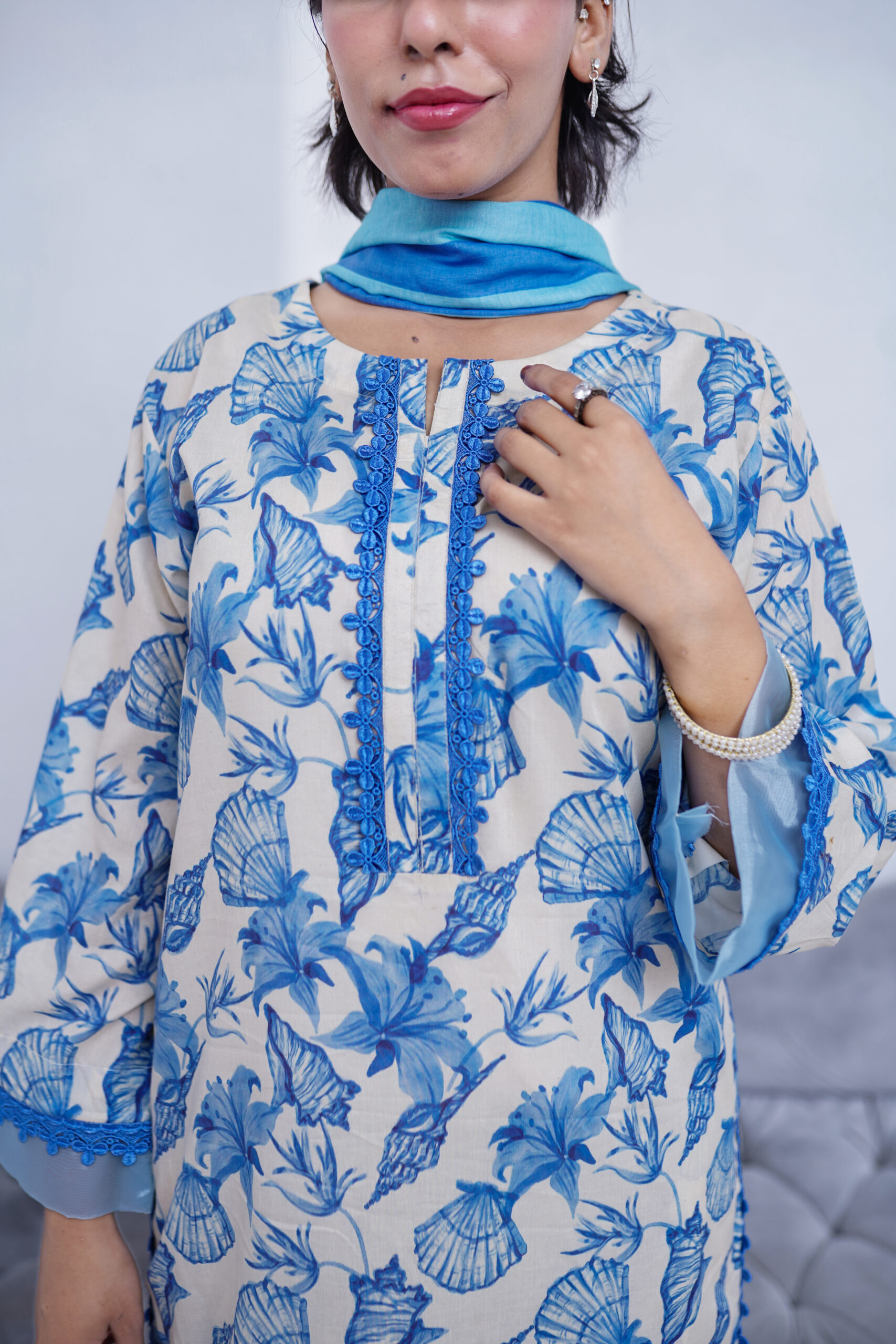 3 PIECE LAWN BLUE FLORAL PRINT ON A WHITE BASE WITH THREAD COLOR